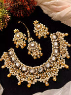 Kundan necklace set with teeka