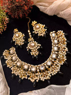 Kundan necklace set with teeka