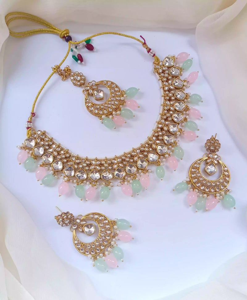 Kundan necklace set with teeka