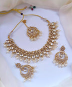 Kundan necklace set with teeka