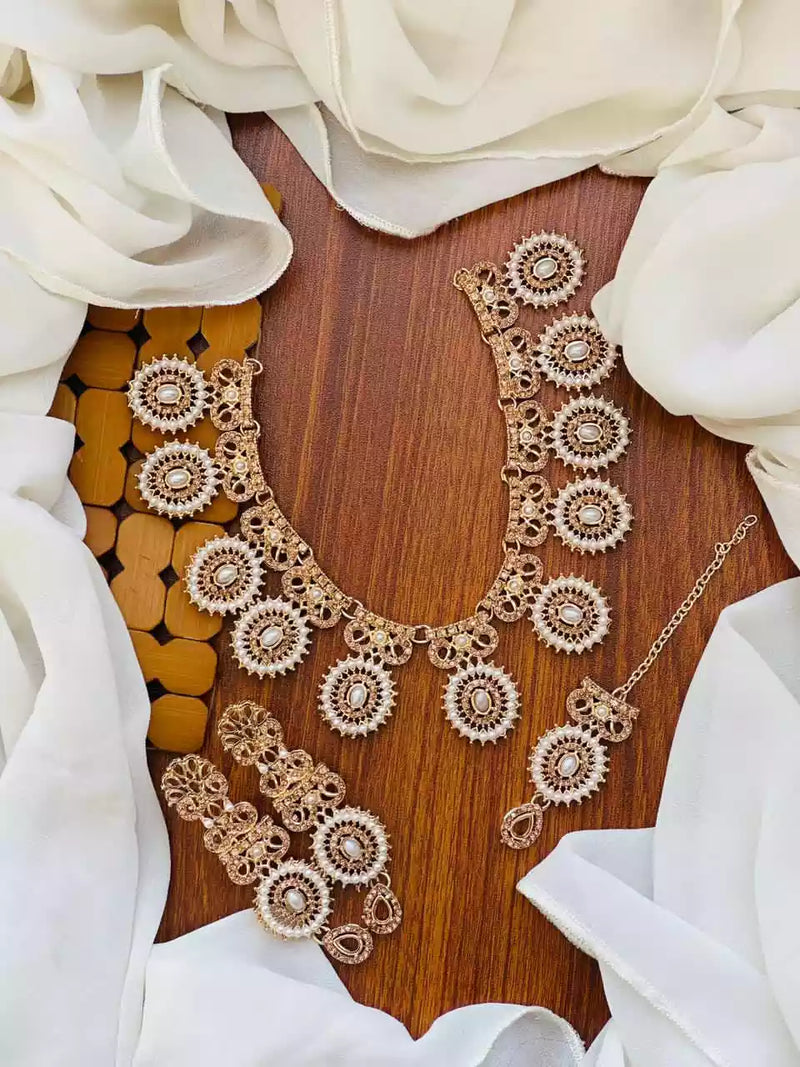 Zircon necklace set with teeka