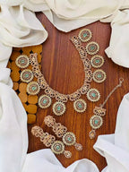 Zircon necklace set with teeka
