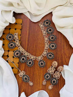 Zircon necklace set with teeka