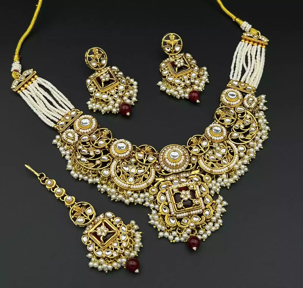 Kundan necklace set with teeka