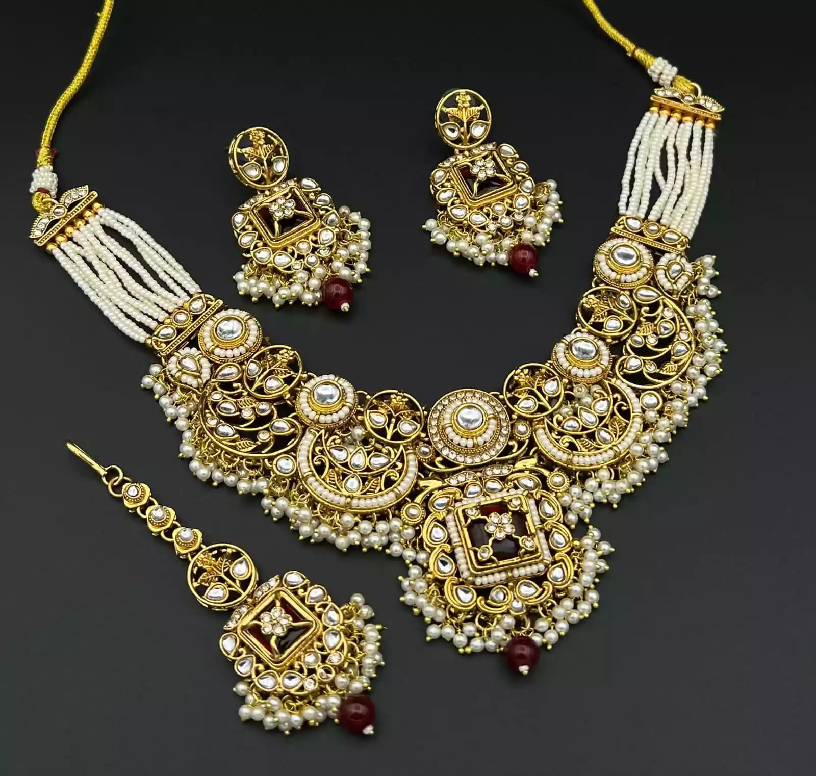 Kundan necklace set with teeka