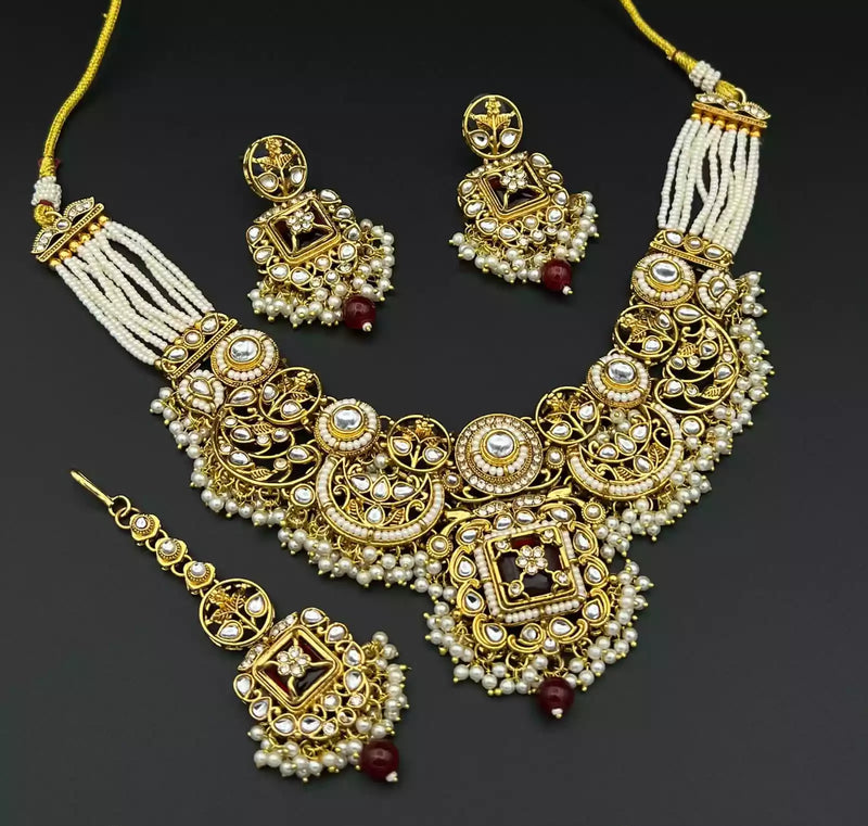 Kundan necklace set with teeka