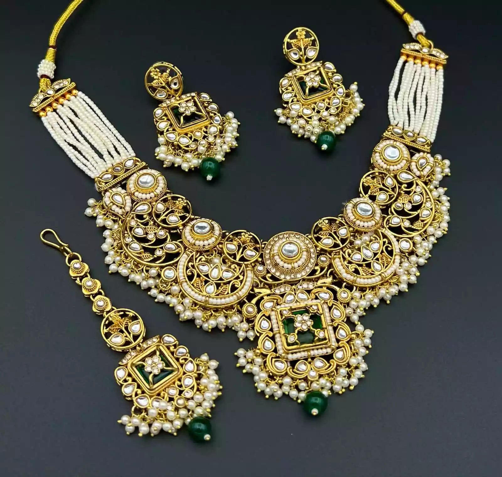 Kundan necklace set with teeka