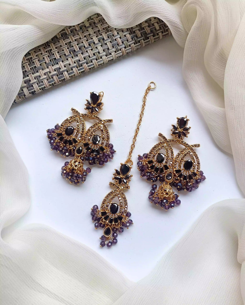Zircon earrings with teeka