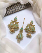Zircon earrings with teeka