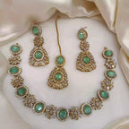 Zircon necklace set with teeka