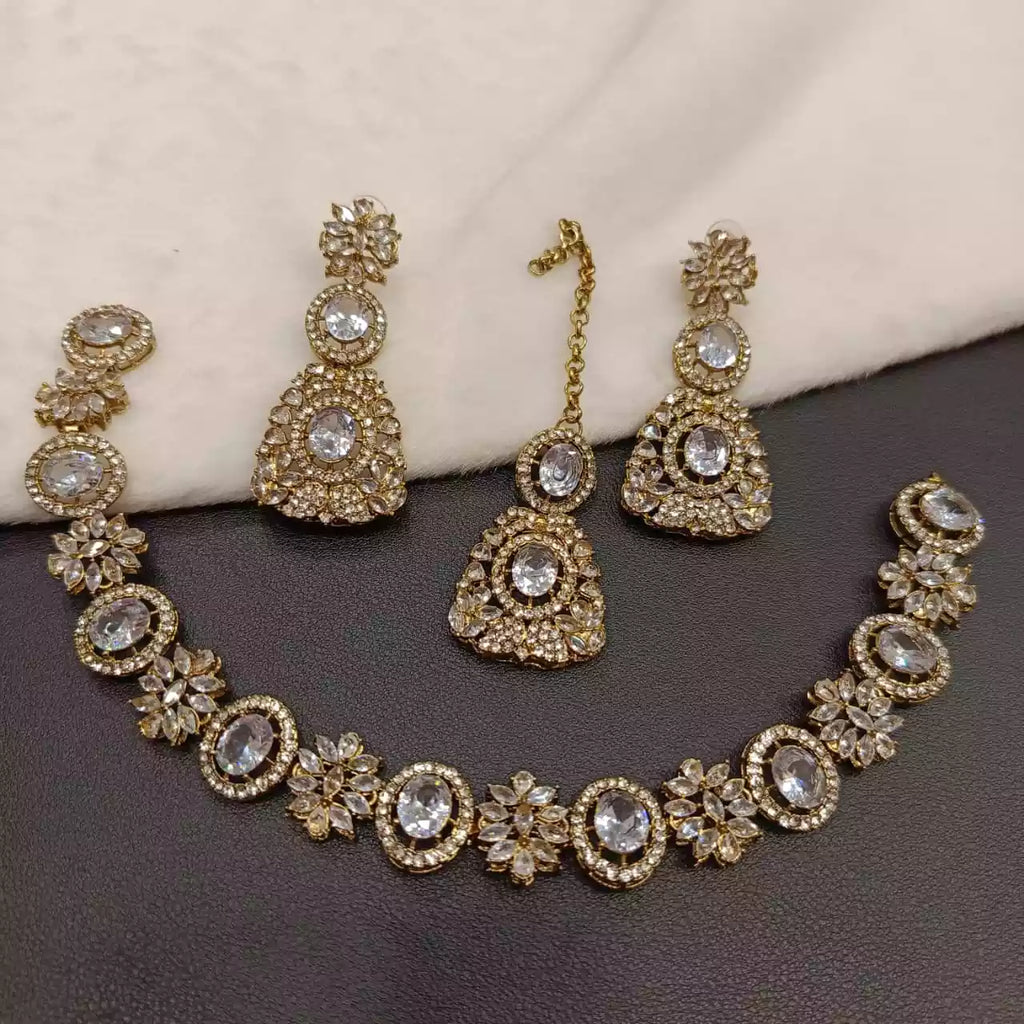 Zircon necklace set with teeka