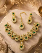 Zircon necklace set with teeka