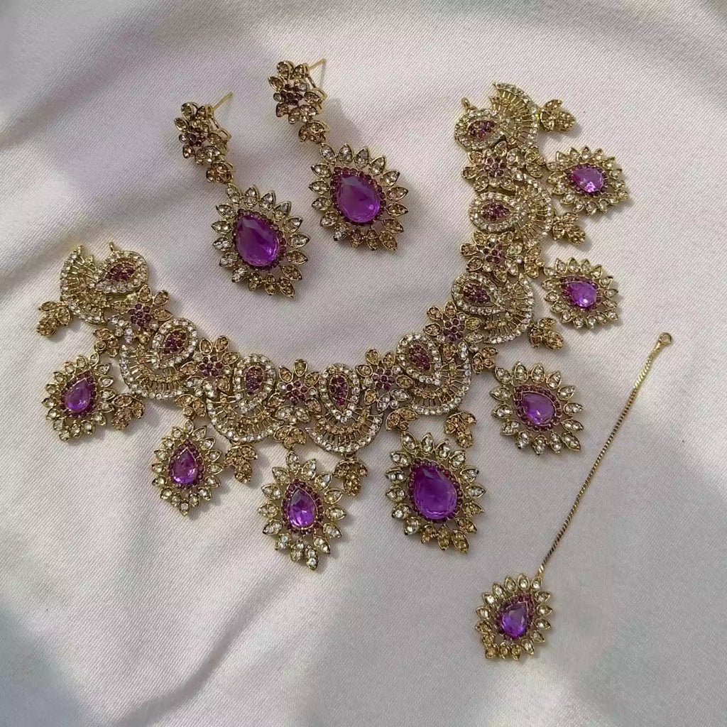 Zircon necklace set with teeka
