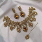 Zircon necklace set with teeka