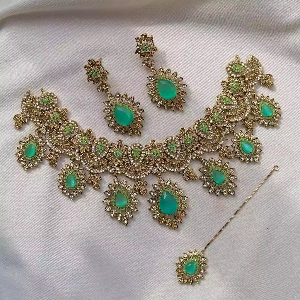 Zircon necklace set with teeka