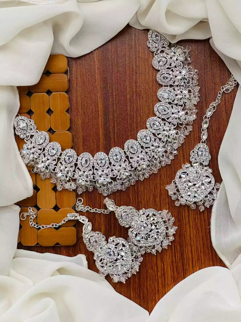 Zircon necklace set with teeka