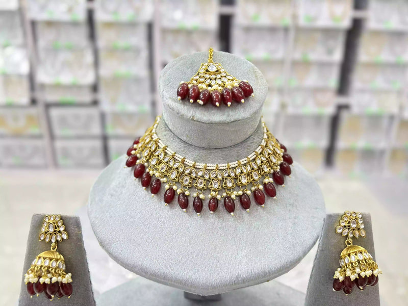 Kundan necklace set with teeka