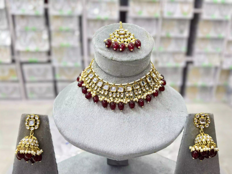 Kundan necklace set with teeka
