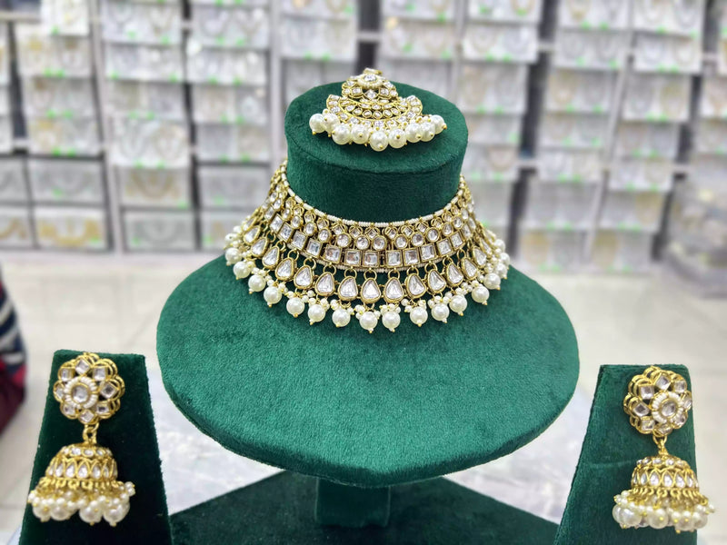Kundan necklace set with teeka