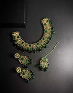 Zircon necklace set with teeka