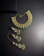 Zircon necklace set with teeka
