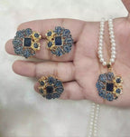 Zircon pendant set with ring
