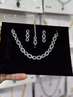 Zircon necklace set with teeka