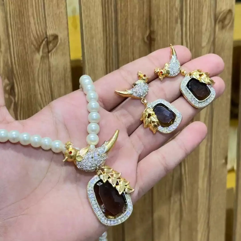 Designer bird locket set