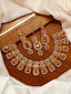 Zircon necklace set with teeka