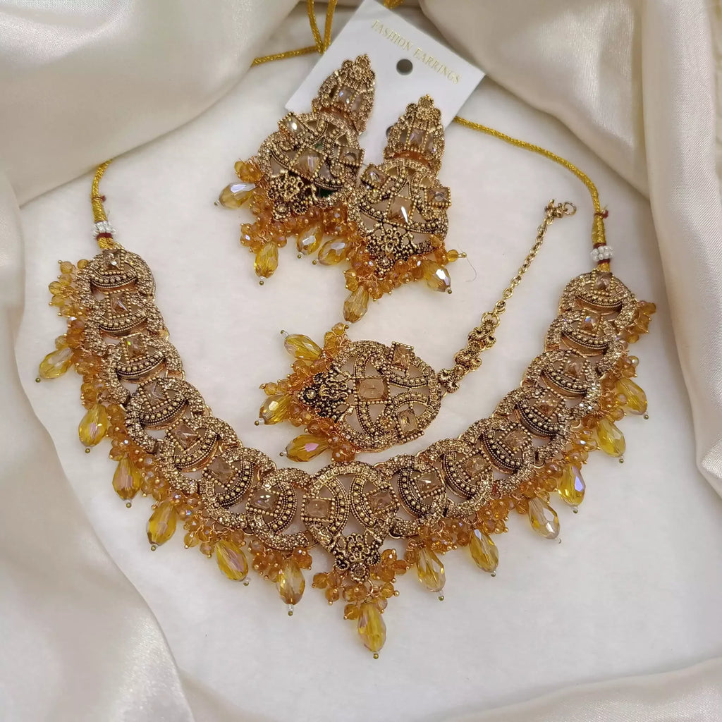Zircon necklace set with teeka