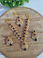 Zircon necklace set with teeka