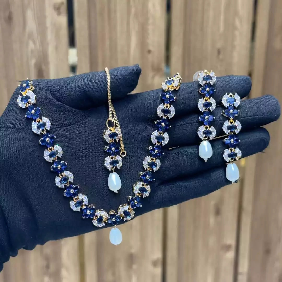 Zircon necklace set with teeka