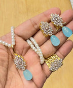 Jarao Zircon locket set
