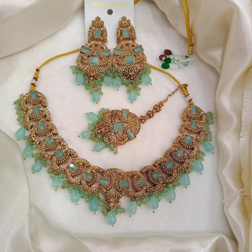 Zircon necklace set with teeka