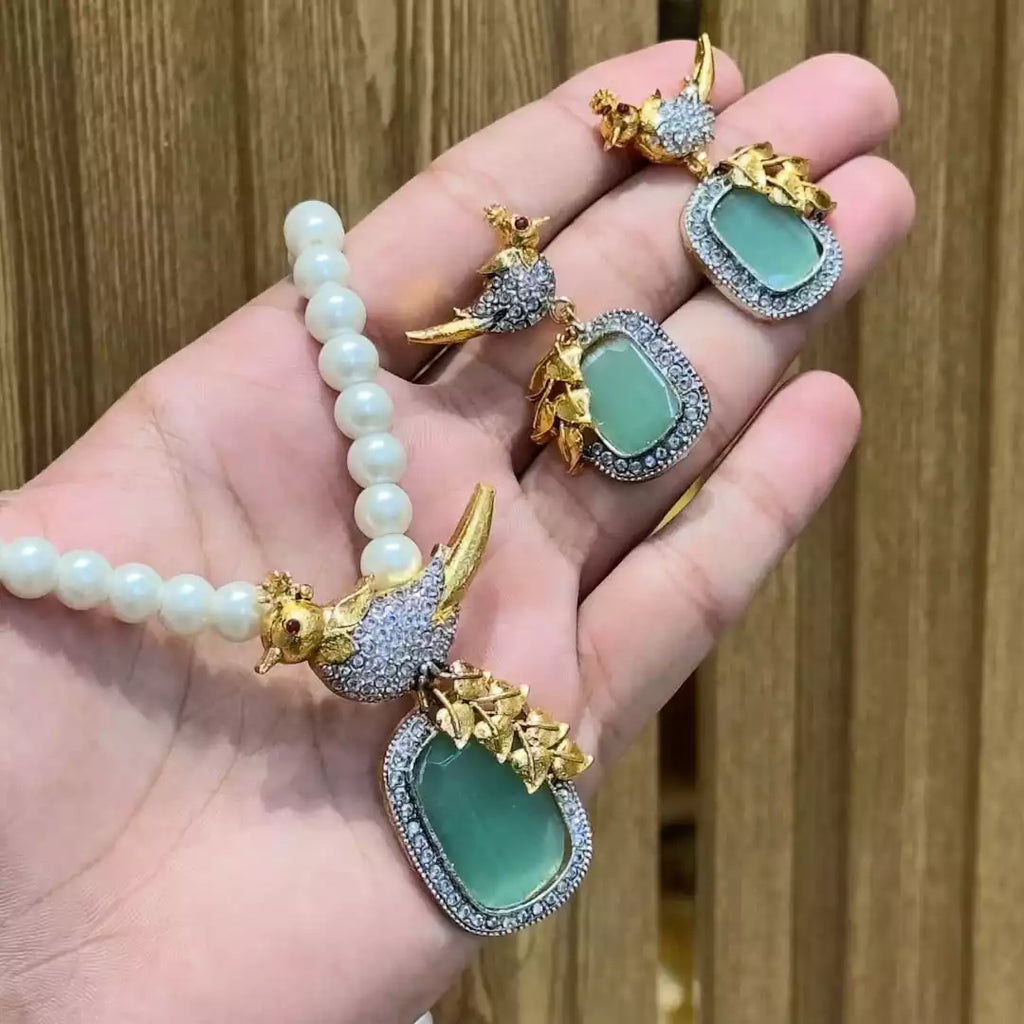 Designer bird locket set
