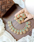 Zircon necklace set with teeka