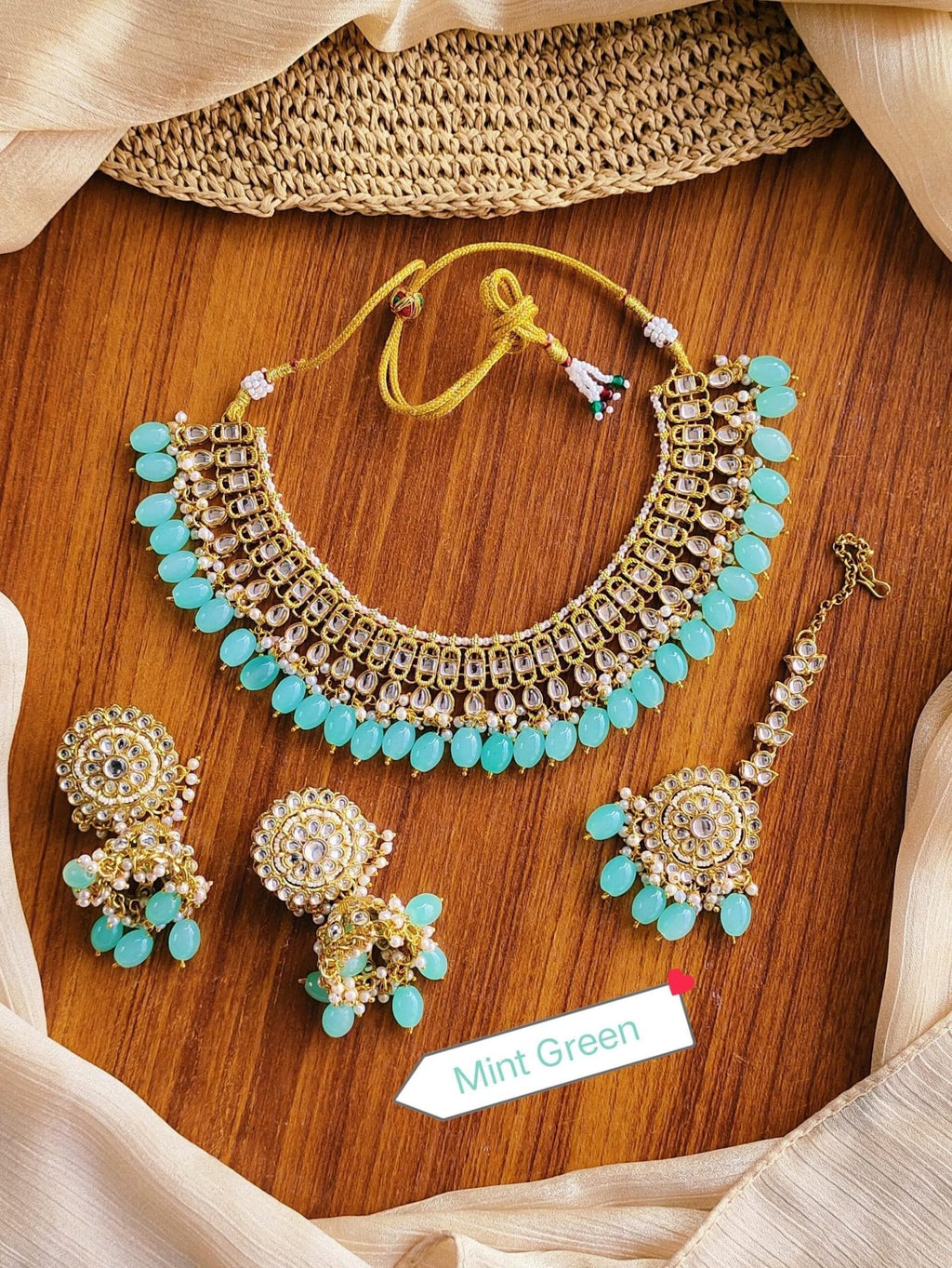 Kundan necklace set with teeka