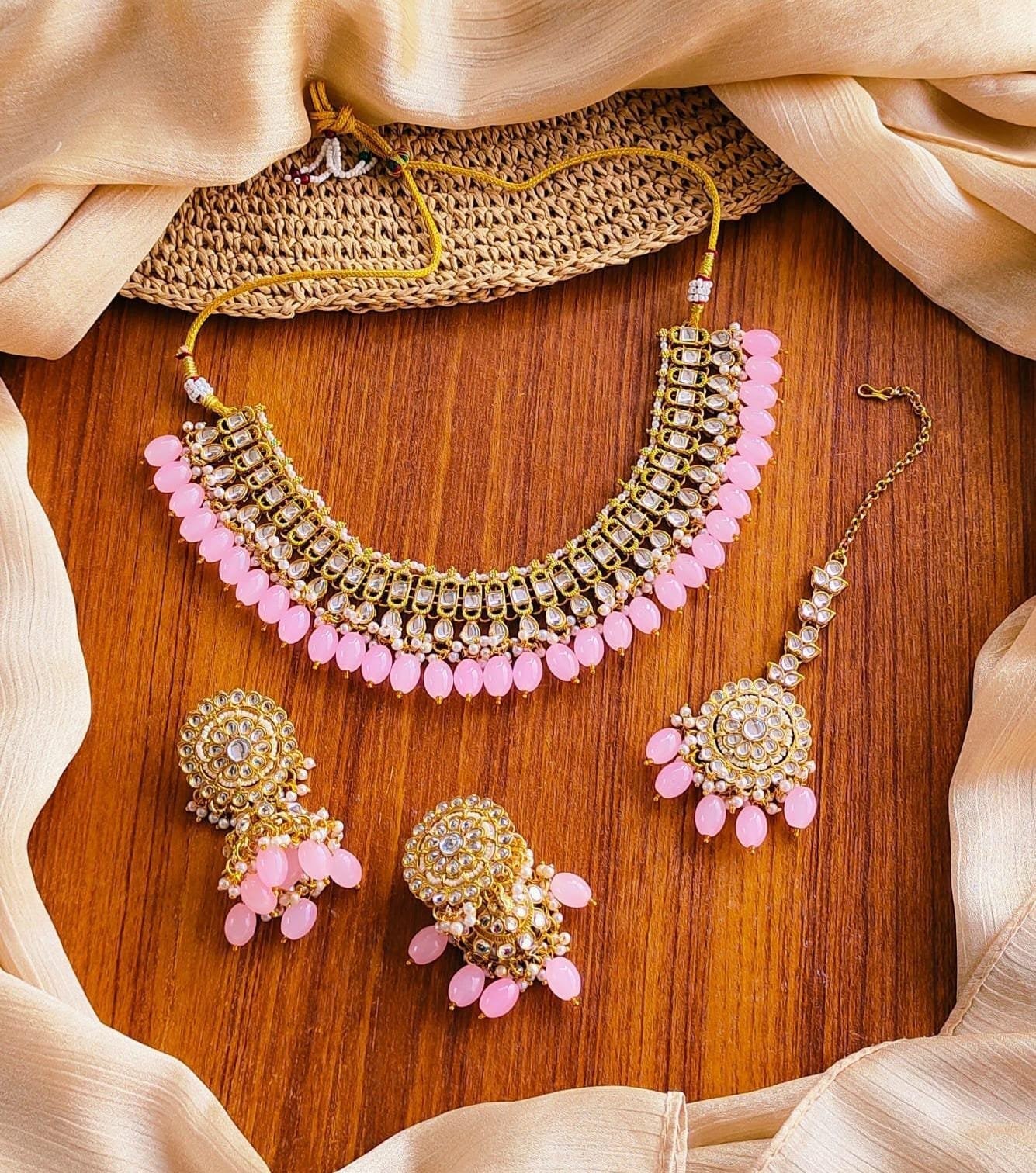 Kundan necklace set with teeka