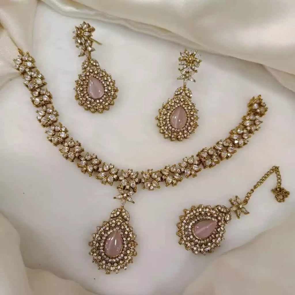 Zircon necklace set with teeka