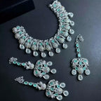 Zircon necklace set with teeka