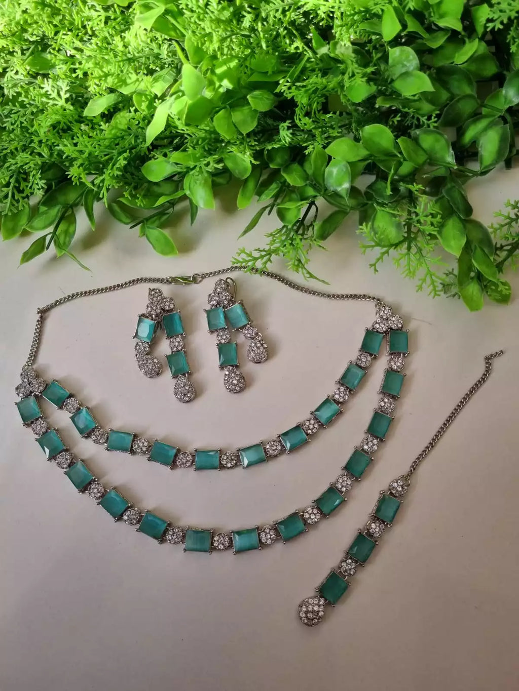 Double layer zircon set with teeka