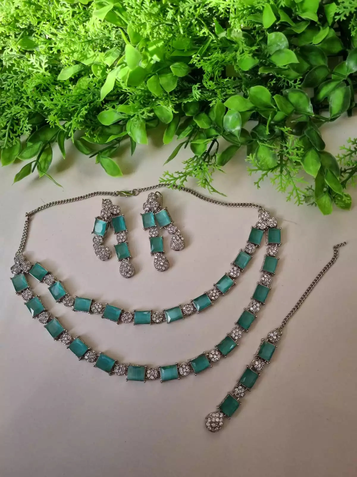 Double layer zircon set with teeka