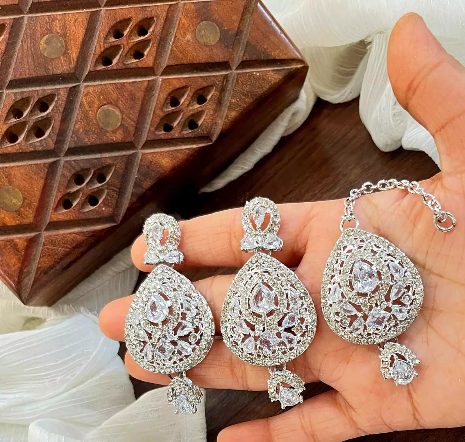 Zircon earrings teeka