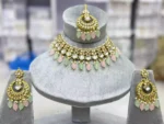 Kundan necklace set with teeka