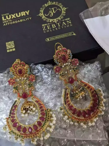 heavy noratan earrings